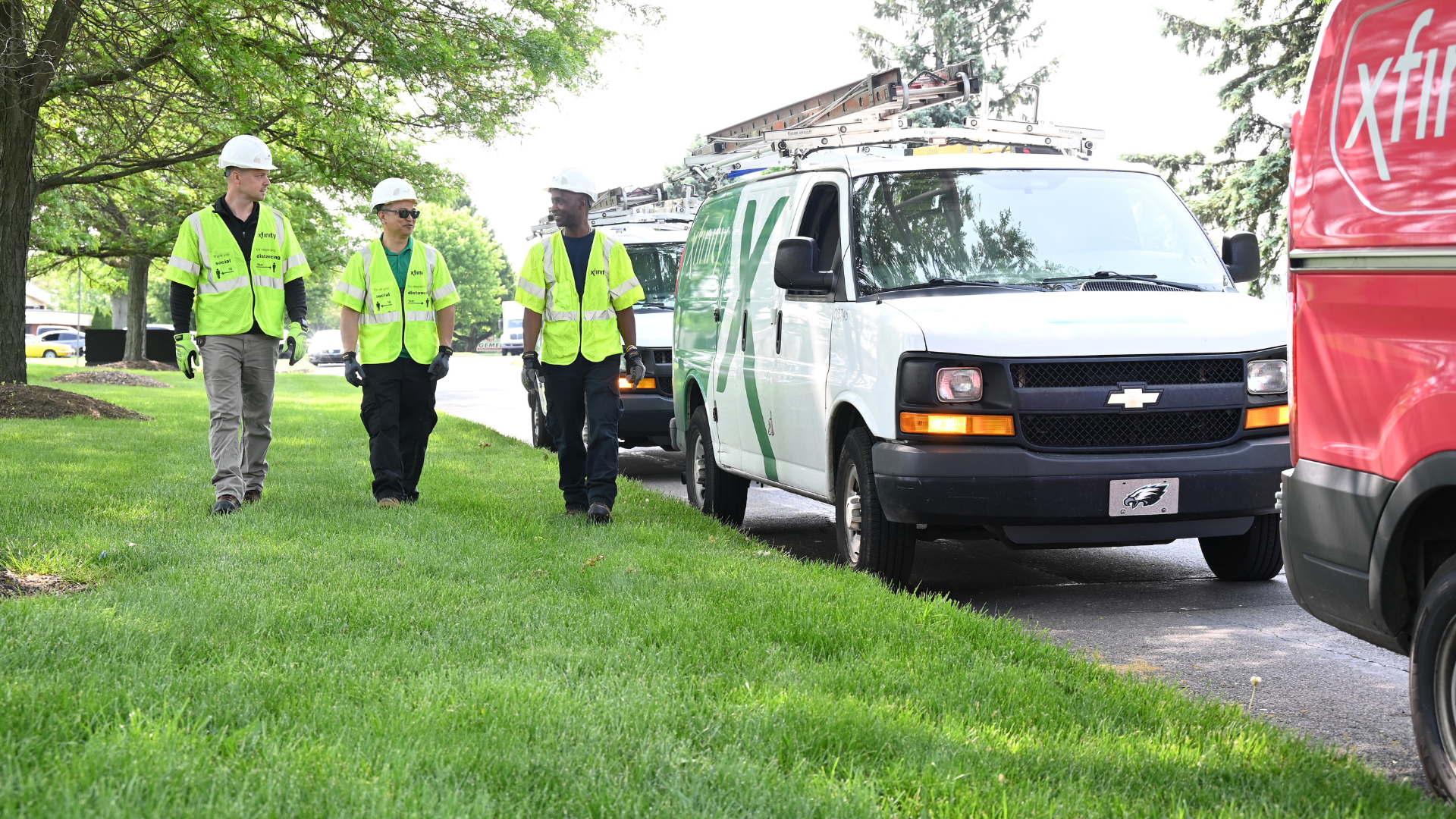 Three Xfinity technicians.