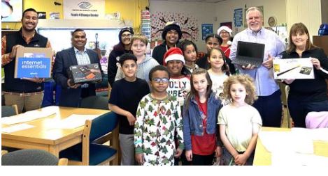 Boys & Girls Clubs of Cumberland County members with Comcast Freedom Region representatives.