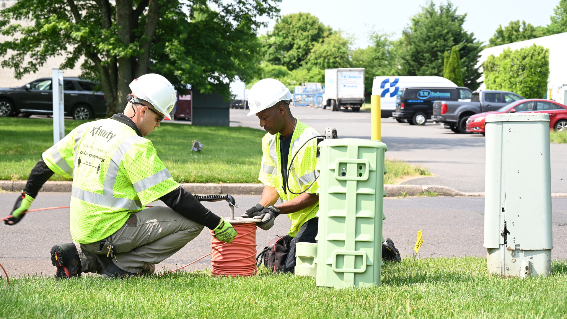 Xfinity technicians working out in the field.