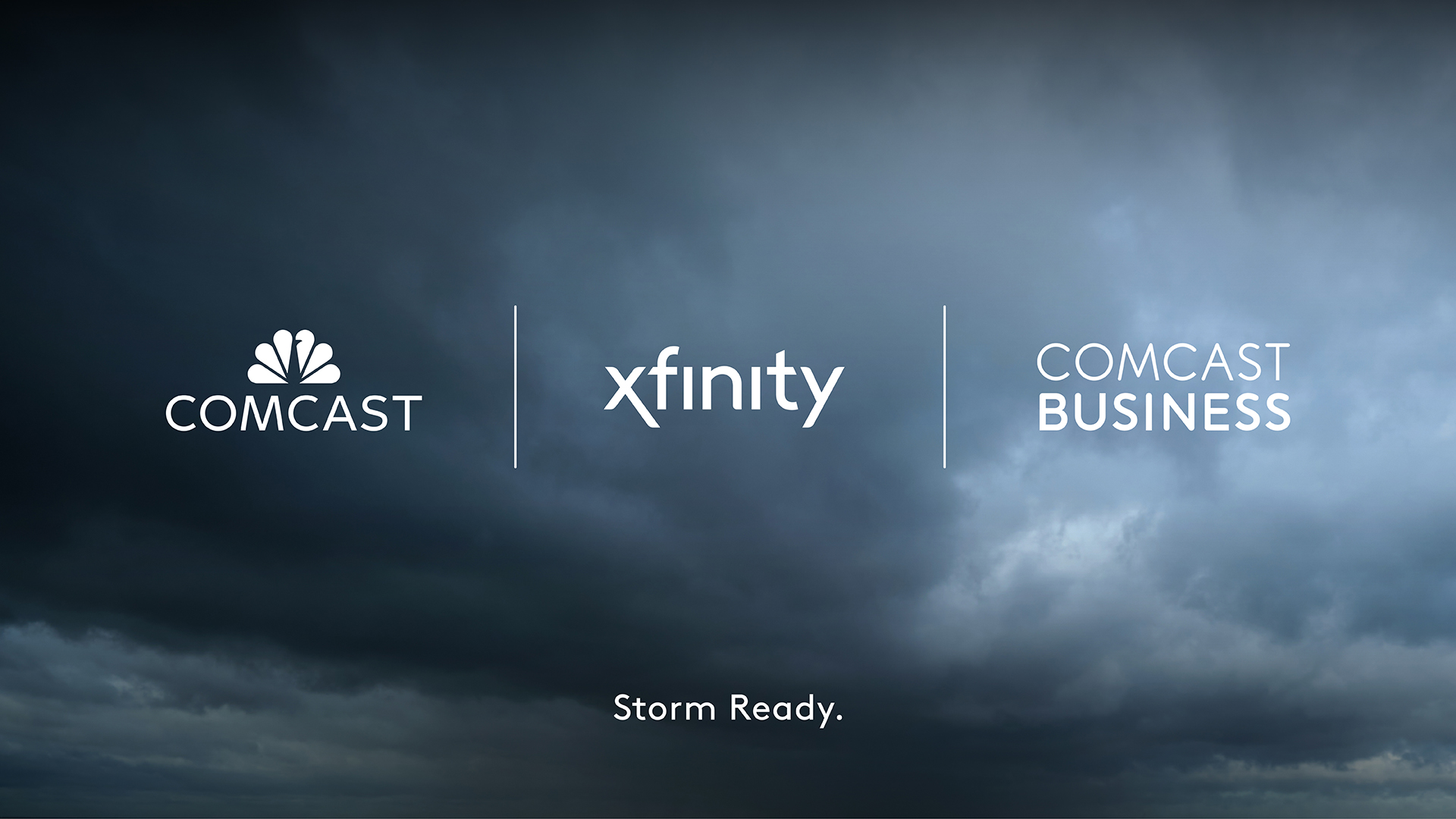 Comcast logo, Xfinity logo and Comcast Business logo in a row with storm clouds in background.