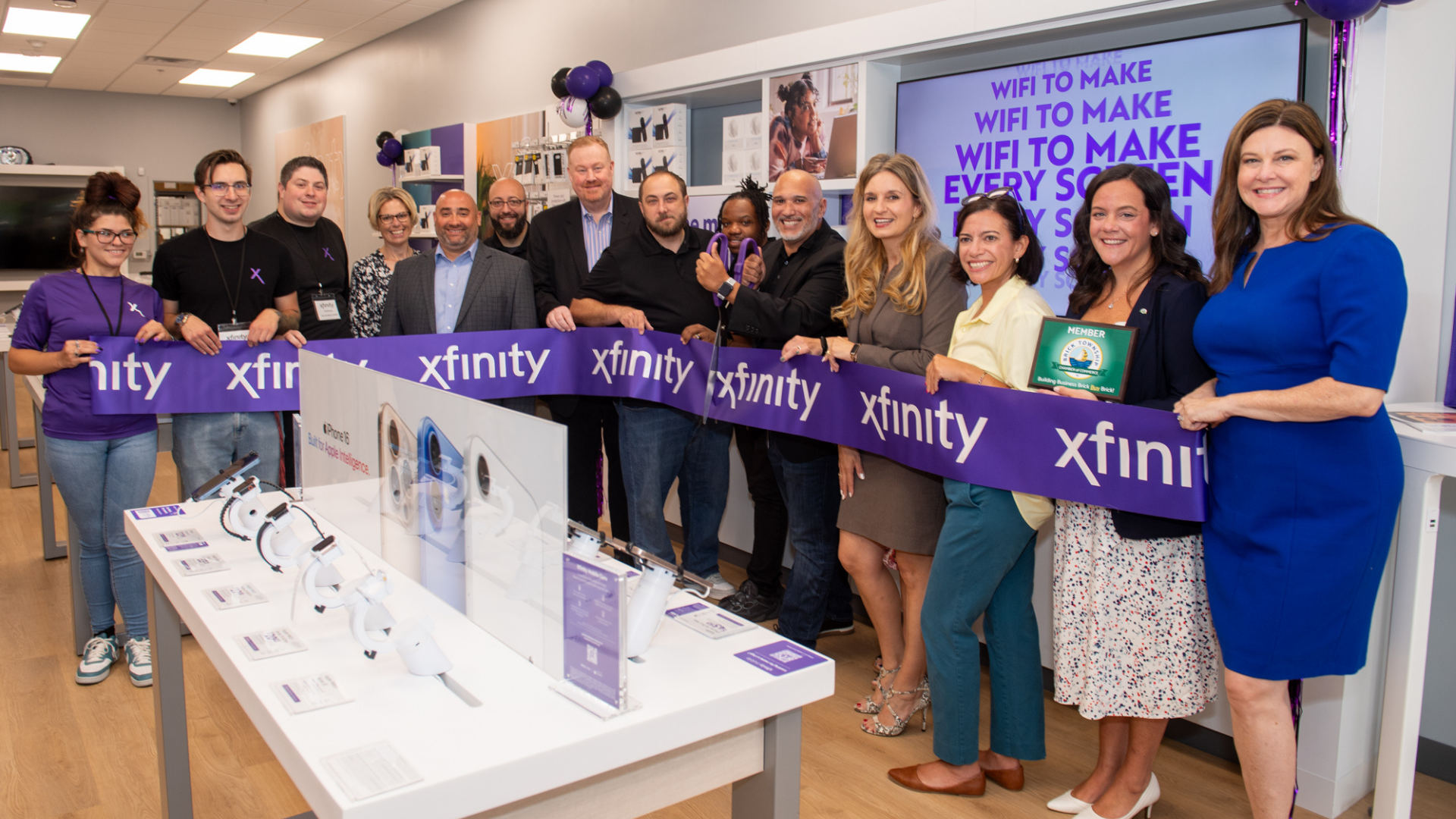 Comcast, community leaders cutting the ribbon at the new Brick Xfinity Store